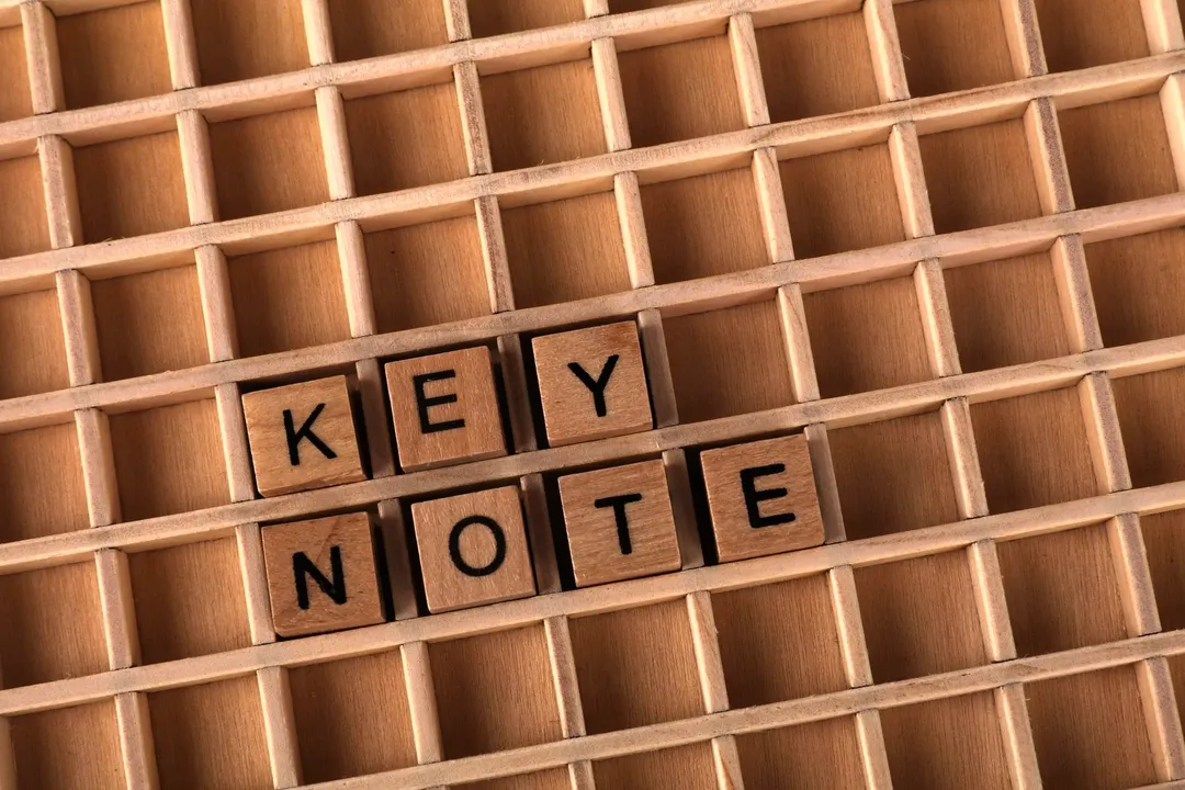 Wooden letter tiles spelling “keynote”